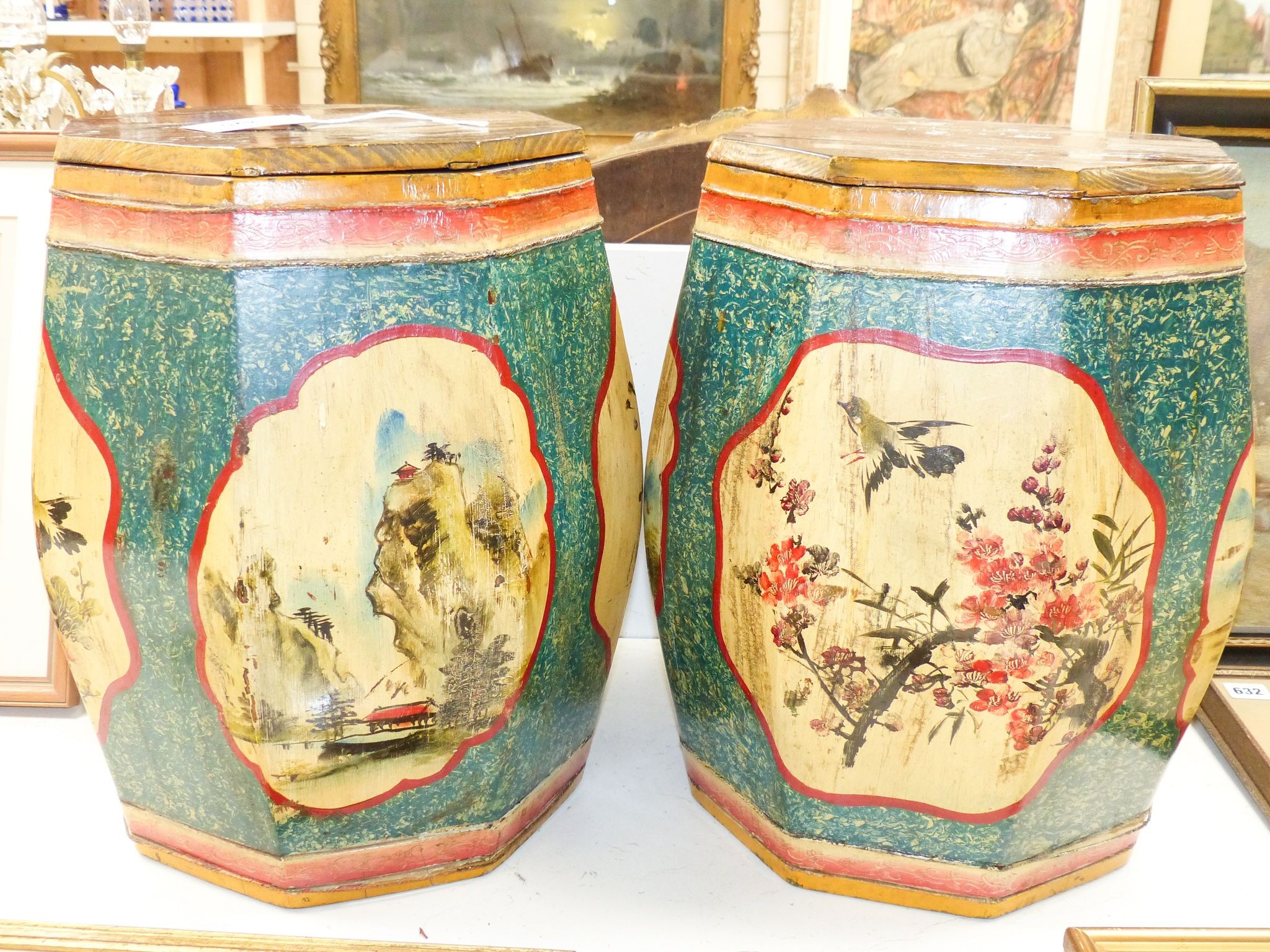 A pair of Chinese painted wood octagonal rice bins 45cm